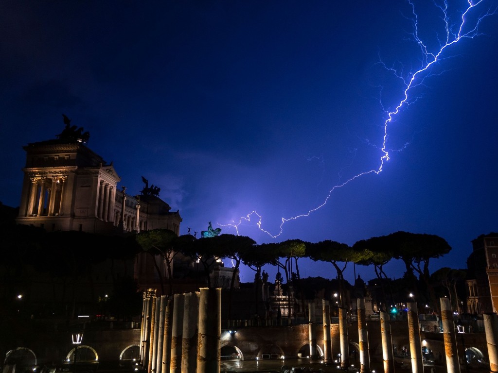 Lightning strikes over the Vittorio Emanuele II monument and its equestrian statue in Rome. LAURENT EMMANUEL/AFP/Getty Images