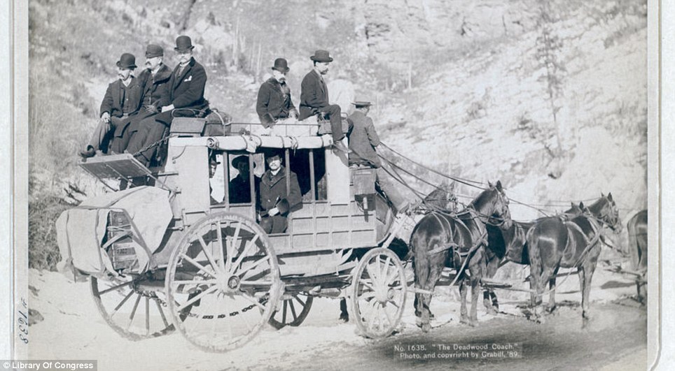 Modern travel: The photograph taken by John C.H Grabill in the 1880s was titled 'The Deadwood Coach' and shows formally dressed passengers both on top and inside