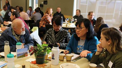 Coalition members in conversation at the 2018 summit.