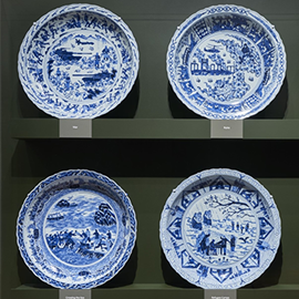 "Blue-and-White Porcelain Plates: War, Ruins, Journey, Crossing the Sea, Refugee Camps, Demonstrations" by Ai Weiwei