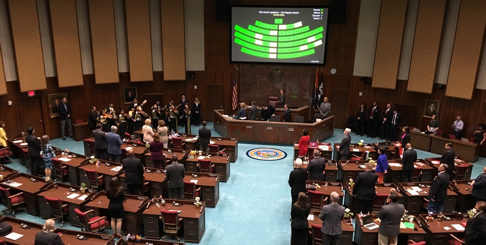 The Floor of the Arizona House with people milling about and at desks