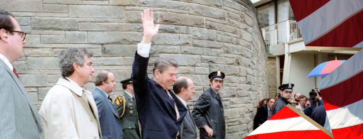President Reagan waves to crowd immediately before being shot in an assassination attempt after exiting Washington Hilton Hotel. 03/30/1981