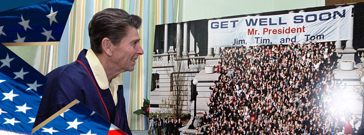 President Reagan looking at "Get Well Soon Mr. President" photo while at George Washington Hospital