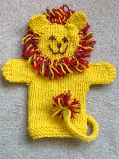 knit lion puppet