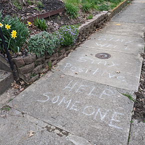 sidewalk with written chalk words