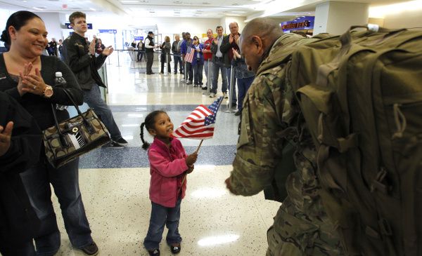Image result for picture of a group of soldier walking in an airport