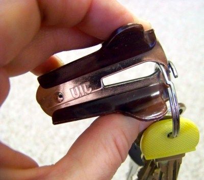 Use a staple remover to add keys to key rings without breaking a nail