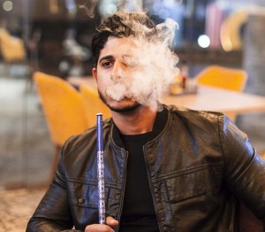 man smoking hooka