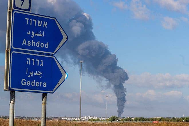 Smoke rises after a rocket fired from the Gaza Strip hit in Ashdod, southern Israel, on Oct. 7, 2023. Photo by Jamal Awad/Flash90.