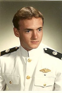 Photo of Mark in his naval aviator uniform.