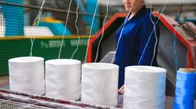 Nylon fibers have a wide range of uses, but current production methods (pictured) create harmful greenhouse gases