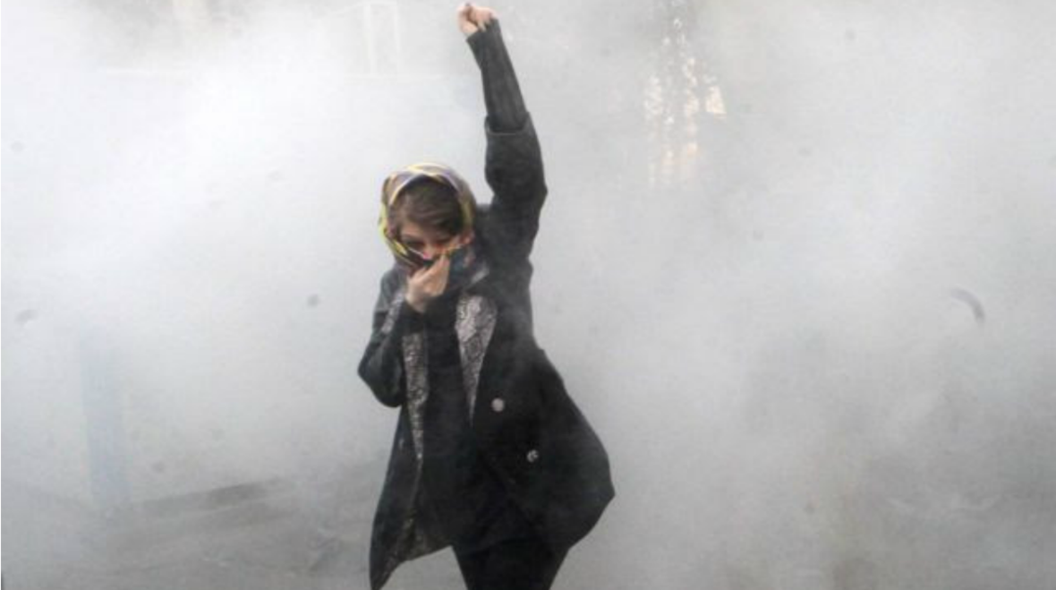 Iranian-protestoer-Tehran-university-December-30-2017-