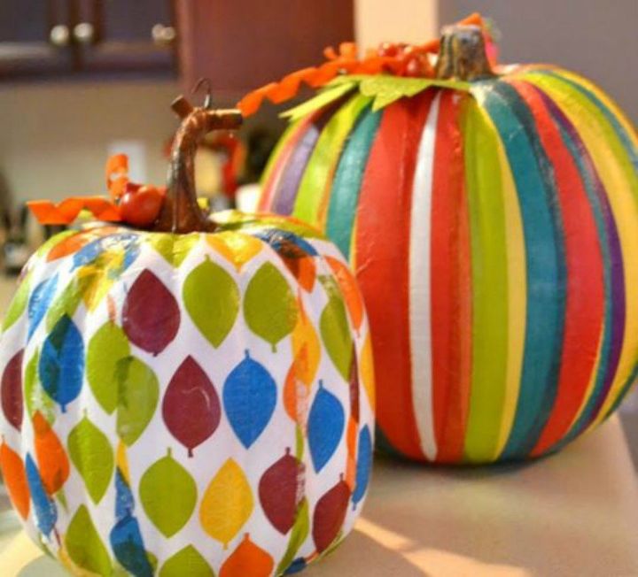 s 13 popular ways to decorate a pumpkin with little or no carving, Decoupage them with colorful napkins