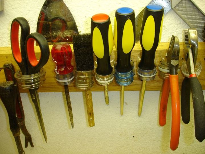 s 30 useful ways to reuse plastic bottles, Hang your tools from tops of bottles