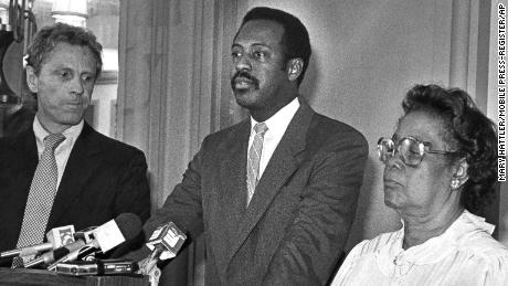 A federal court jury in Mobile, Ala., awarded Beulah May Donald $7 million in damages from the United Klans of America Inc., Feb. 12, 1987. Two Klan members murdered Mrs. Donald&#39;s son, Michael Donald, 19, in 1981. Mrs. Donald is shown at a news conference after the verdict with her attorneys, State Sen. Michael Figures, center at podium, and Morris Dees, founder of the Southern Poverty Law Center in Montgomery. (AP Photo/Mobile Press-Register/Mary Hattler)