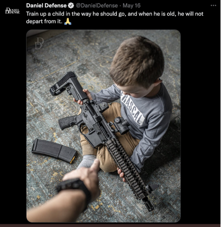 A Twitter post by Daniel Defense featuring a Bible verse and an image of a toddler holding a rifle