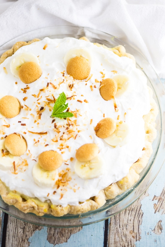 This light and fluffy Banana Cream Pie recipe with pudding is loaded with fresh bananas and silky filling, then topped with piles ofÂ  homemade whipped cream and toasted coconut.Â The end result of this homemade old-fashioned banana cream pie is beyond words. The banana lovers you bake it for will be in pie heaven.