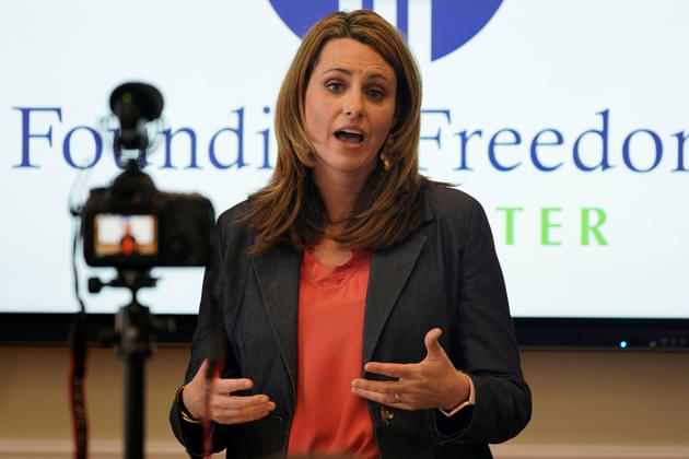 Victoria Cobb, of The Family Foundation, gestures during a news conference at the foundation offices in Richmond, Va., Tuesday, March 30, 2021. More recently, Cobb said her group was denied service at a restaurant for their biblical beliefs. (AP Photo/Steve Helber)