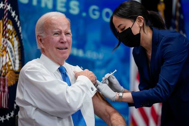 FILE - President Joe Biden receives his COVID-19 booster from a member of the White House medical unit during an event in the South Court Auditorium on the White House campus, Oct. 25, 2022, in Washington (AP Photo/Evan Vucci, File). On January 30, 2023, the White House announced that the US plans to end the coronavirus public health emergency on May 11.