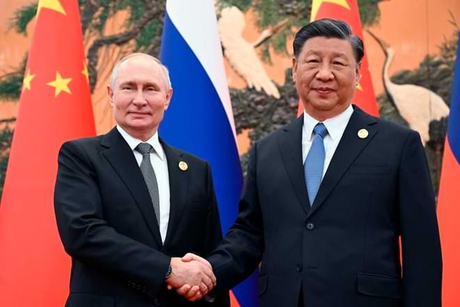 Chinese President Xi Jinping, right, and Russian President Vladimir Putin pose for a photo prior to their talks on the sidelines of the Belt and Road Forum in Beijing, China, on Wednesday, Oct. 18, 2023. (Sergei Guneyev, Sputnik, Kremlin Pool Photo via AP)
