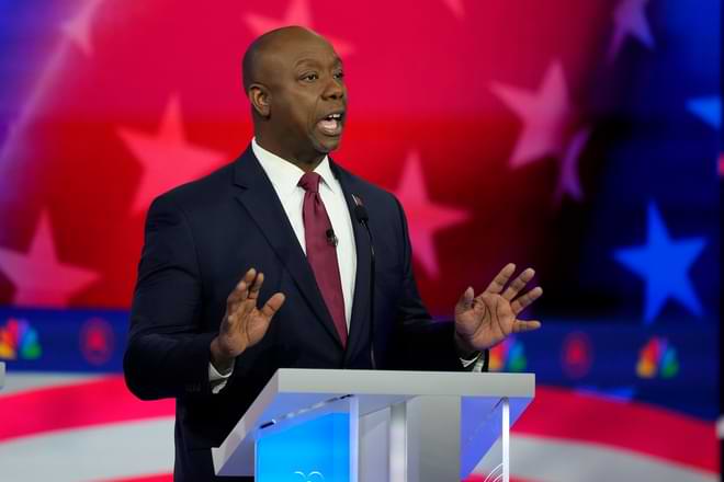 Republican presidential candidate Sen. Tim Scott, R-S.C., speaks during a Republican presidential primary debate hosted by NBC News, Wednesday, Nov. 8, 2023, at the Adrienne Arsht Center for the Performing Arts of Miami-Dade County in Miami. (AP Photo/Rebecca Blackwell)