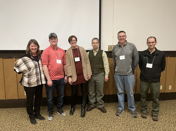 DFW Director’s Team of the Year award winners standing in a line.