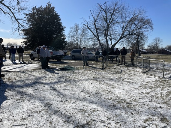 DNR staff demonstrates how to set up a walk-in funnel trap which is used to round up Canada geese.