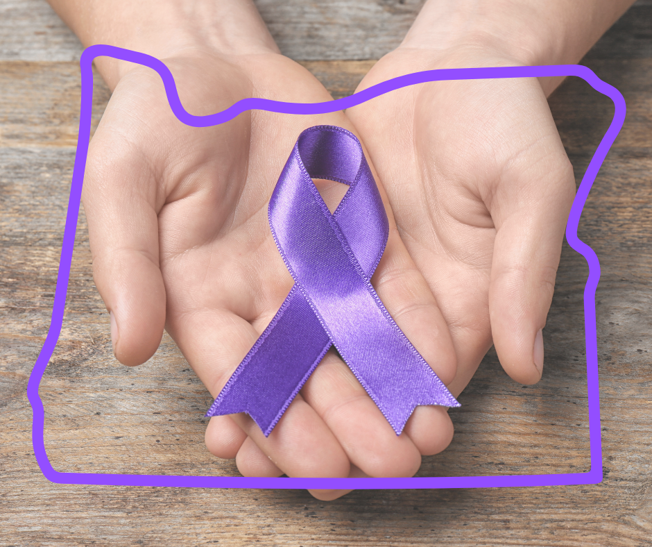 image of two hands cupping a purple overdose awareness ribbon, surrounded by an outline of Oregon