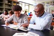 Black male teacher and student
