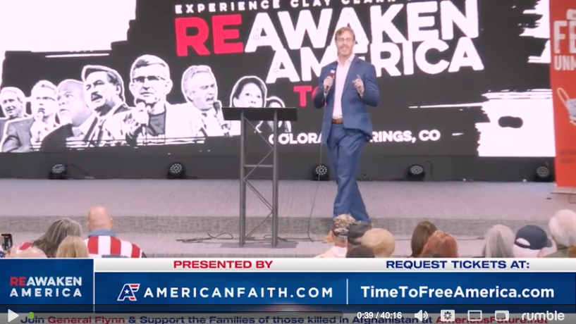 Image of Dr. Bryan Ardis speaking at REAWAKEN AMERICA TOUR