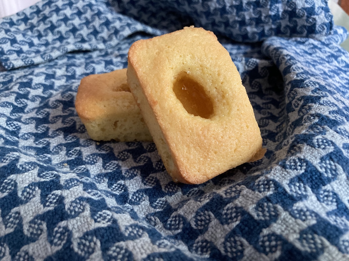 Two cakes on a blue towel