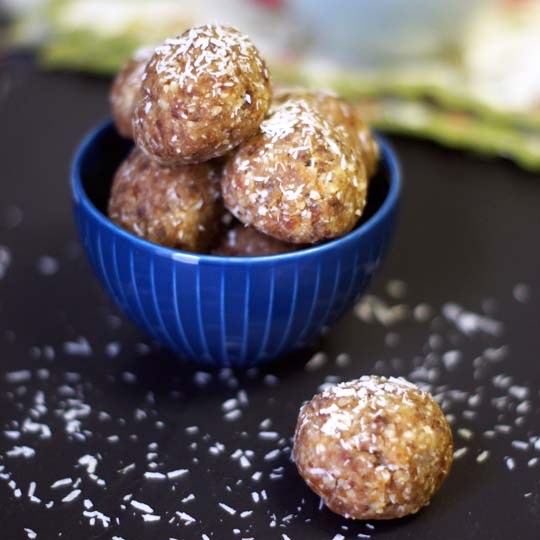 date energy balls in a small bowl