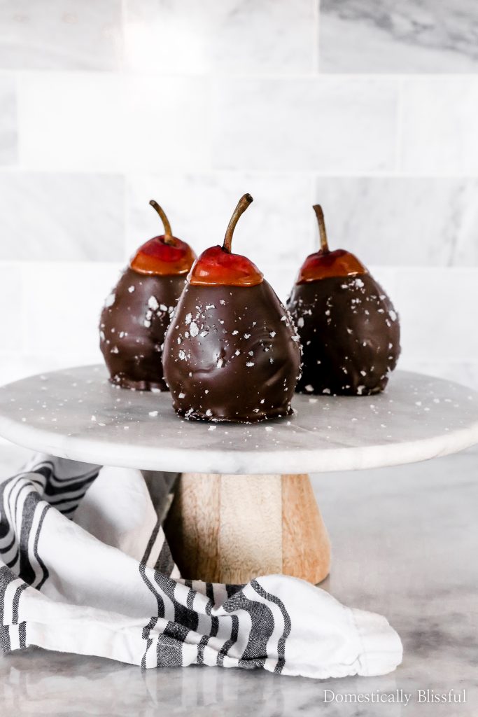These Sea Salt Dark Chocolate Caramel Pears are a simple 4-ingredient recipe that is a perfect holiday party dessert.