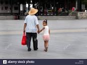 Image result for picture of a man and a little girl walking