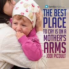 Image result for picture of a mother with crying baby in her arms