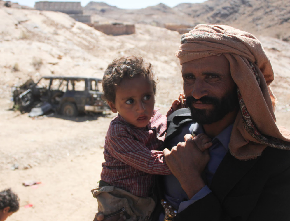 Yemeni father with child