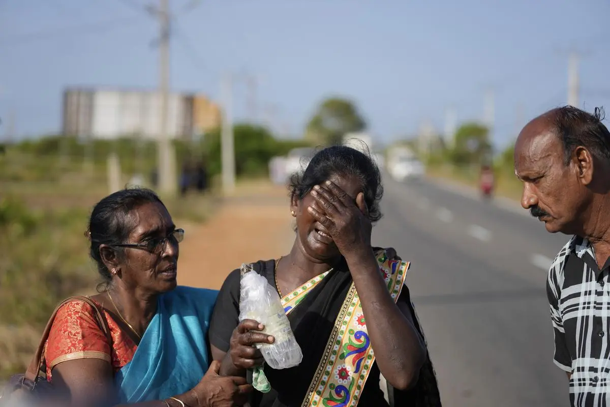 Senthilvel Sothiladchumi, an ethnic Sri Lankan Tamil whose son went missing during the Sri Lankan civil war, cries as she leaves the site of a mass grave where authorities exhibited unearthed belongings in an effort to secure the identities of the victims, in Chemmani, Sri Lanka, August 5, 2025. Senthilvel Sothiladchumi, an ethnic Sri Lankan Tamil whose son went missing during the Sri Lankan civil war, cries as she leaves the site of a mass grave where authorities exhibited unearthed belongings in an effort to secure the identities of the victims, in Chemmani, Sri Lanka, August 5, 2025.