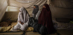 An Egyptian woman and two daughters in their tent, at Roj Camp for the families of Islamic State members in Kurdish-controlled northern Syria, June 23, 2018. More than 2,000 foreign women and children are being held in such camps, trapped in a legal and political limbo, unwanted by any nation, with no foreseeable way out.  *** Local Caption *** ISIS ISIL DAESH FIGHTERS MILITANTS BYSTANDERS VICTIMS ISLAMIST KURDISTAN PROBLEMS CRISIS CALIPHATE ABANDONED LOST CONFLICT MIDDLE EAST