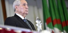 Algerian speaker of the upper house of parliament, Abdelkader Bensalah, is pictured during  a parliamentary session at the Palais des Nations in the Algerian capital Algiers on April 9, 2019, after lawmakers named him as interim president, following last week's resignation of Abdelaziz Bouteflika in the face of mass protests. - The move by parliament follows constitutional rules but goes against the demands of demonstrators, who have pushed for Bensalah and other top politicians to stand down. (Photo by RYAD KRAMDI / AFP)