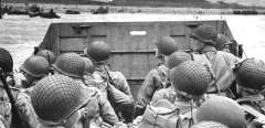American shock troops huddle behind the protective front of a landing craft as it nears the beachhead on the Normandy coast of France (Omaha Beach) in front of Vierville-sur-Mer.
June 6, 1944
Photos12.com - Coll-DITE - USIS