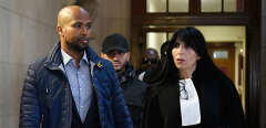(FILES) In this file photo taken on September 29, 2017 French rapper Rohff (L) arrives with his lawyer Malika Ibazatene at Paris courthouse for his trial. - On June 6, 2019 Paris courthouse condemned French rapper Rohff's of a five-year jail sentence during his appeal trial for an attack on Booba's Paris clothing shop in 2014. (Photo by Lionel BONAVENTURE / AFP)