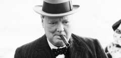 FILE - This Aug. 23, 1939 file photo shows Winston Churchill. A cigar once half-smoked by British Prime Minister Winston Churchill during a 1947 trip to Paris has sold for just over $12,000 during an online auction. Boston-based RR Auction says the 4-inch (10-centimeter) cigar was bought Wednesday evening, Oct. 11, 2017, by a collector from Palm Beach, Florida. The buyer's name wasn't released. (AP Photo)/BX401/17285736378670/1710122238