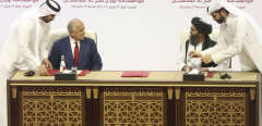 U.S. peace envoy Zalmay Khalilzad, left, and Mullah Abdul Ghani Baradar, the Taliban group's top political leader sign a peace agreement between Taliban and U.S. officials in Doha, Qatar, Saturday, Feb. 29, 2020. The United States is poised to sign a peace agreement with Taliban militants on Saturday aimed at bringing an end to 18 years of bloodshed in Afghanistan and allowing U.S. troops to return home from America's longest war. (AP Photo/Hussein Sayed)/HAS121/20060487351473//2002291440