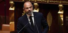 French Prime Minister Edouard Philippe  delivers a speech as he presents the government's plan to exit from the lockdown situation at the French National Assembly in Paris on April 28, 2020, on the 43rd day of a lockdown aimed at curbing the spread of the COVID-19 pandemic, caused by the novel coronavirus. - France on April 28 unveils how it intends to progressively lift a six-week lockdown credited with checking the coronavirus outbreak. The French prime minister's address will be followed by a debate and a vote, with just 75 of the 577 lawmakers allowed into the National Assembly in line with social distancing measures. The rest will vote by proxy (Photo by David NIVIERE / POOL / AFP)