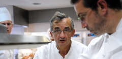 French chef Michel Bras (C) poses in his restaurant, in Laguiole, southwestern France, on September 21, 2012.      AFP PHOTO / REMY GABALDA (Photo by REMY GABALDA / AFP)