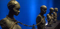 A photo taken on May 8, 2015 shows a piece entitled "Slave Chain with Four Yokes" from the Dexue voodoo convent in Adounko, Benin, dating from the 19th century at the Memorial ACTe, the Caribbean Centre of Expression and Memory of Slavery and the Slave Trade, in Point-a-Pitre. The memorial will be inaugurated by French President Francois Hollande on May 10, the National Day for the Abolition of Slavery and the Slave Trade in France.