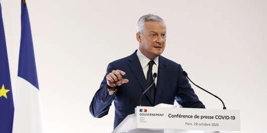 French Economy and Finance Minister Bruno Le Maire speaks during a press conference on the measures of a new coronavirus lockdown taken to curb the spread of the Covid-19 outbreak caused by the novel coronavirus, at the Hotel de Matignon in Paris, on October 29, 2020. - President Emmanuel Macron announced on October 28, 2020 a new coronavirus lockdown until at least December 1, hoping to bring under control an outbreak that is poised to overwhelm hospitals in a matter of days. He admitted that a curfew for Paris and other major cities imposed two weeks ago had failed to stop a second wave of cases that has sent the death toll in France to nearly 35,000. (Photo by Ian LANGSDON / POOL / AFP)