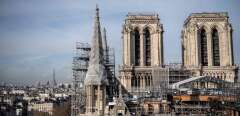 A photograph taken on November 24, 2020 in Paris shows a view of Notre-Dame cathedral during reconstruction works. - Reconstruction of Notre-Dame Cathedral in Paris reached a turning point on November 24 with the removal of the last portions of scaffolding that melted during last year's blaze, which will allow crucial protective and stabilisation work to proceed. (Photo by Martin BUREAU / AFP)