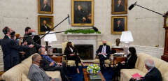 President Joe Biden addresses a bipartisan meeting about the American Jobs Plan, in the Oval Office of the White House in Washington on Monday, April 12, 2021, as Vice President Kamala Harris, left, looks on. Amr Alfiky/The New York Times) *** Local Caption *** CORONAVIRUS PANDEMIC COVID-19 FACE MASK DISTRICT OF COLUMBIA NORTH AMERICA PANEMDIC SUPPLY CHAIN SEMICONDUCTOR ECONOMY INRASTRUCTURE BUSINESS GROWTH INFRASTRUCTURE BRIDGES HIGHWAY INTERSTATE INTERNET
