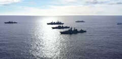 6569318 10.06.2021 This handout video grab released by the Russian Defence Ministry shows an aerial view of an operational exercise of diverse fleet forces taking place in the central part of the Pacific Ocean. Up to 20 surface ships, submarines and support vessels, and around 20 planes, including long-range anti-submarine aircraft and interceptor fighters, take part in the exercise. Editorial use only, no archive, no commercial use. Russian Defence Ministry (Photo by Russian Defence Ministry / Sputnik via AFP)
